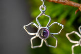 Ohrringe mit blütenförmigen Amethysten