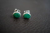 Boucles d'oreilles avec émeraudes ovales