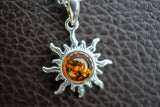 Pendentif Soleil en Ambre Cognac de la Mer Baltique (Moyen)