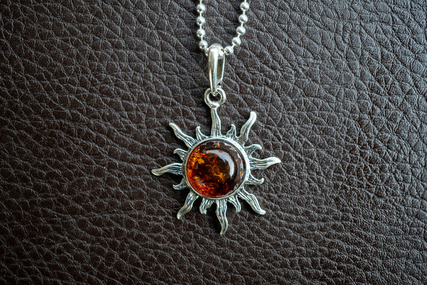 Pendentif soleil en argent 925 avec ambre cognac de la Mer Baltique