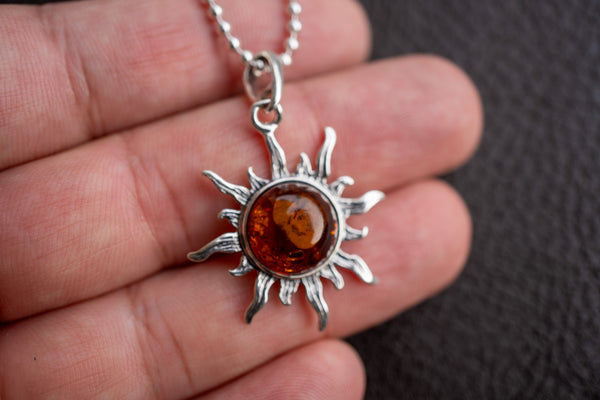 Pendentif soleil en argent 925 avec ambre cognac de la Mer Baltique